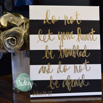 black and gold striped wall art